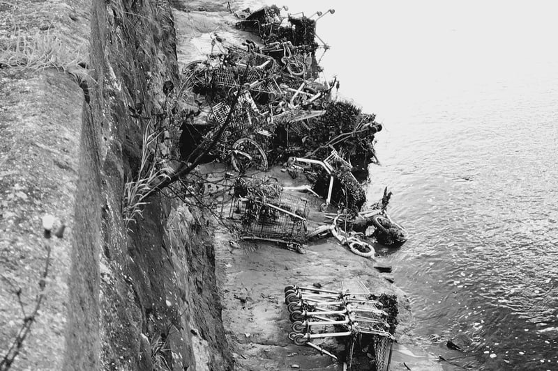 A mangled mess of trolleys dumped in the River Lune at Lancaster. Picture by Phil Taylor.