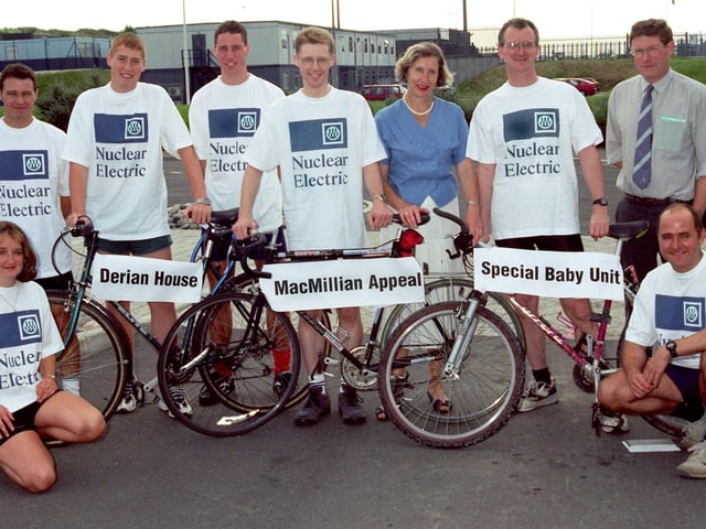 Workers from Heysham Power Stations 1 and 2 who donated £600 to Derian House Children's Hospice, MacMillan Appeal and the Special Care Baby Unit, the proceeds from a sponsored cycle ride round trip from Heysham to Hartlepool. Accepting one of the cheques on behalf of the MacMillan Appeal is appeal manager Alma Carruthers.