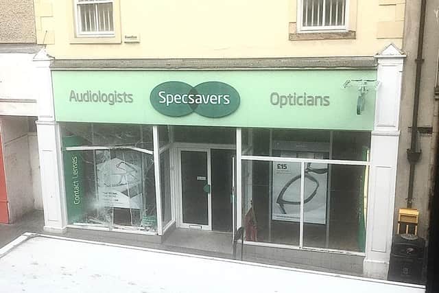 The smashed window at Specsavers after a van had reversed into it. Photo by Jack Knight