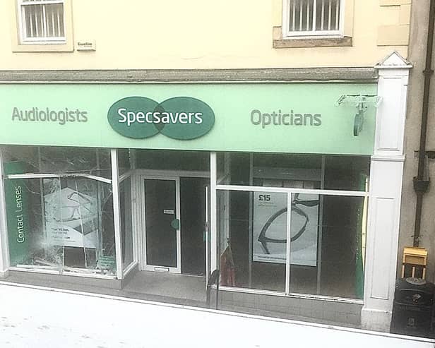The smashed window at Specsavers after a van had reversed into it. Photo by Jack Knight