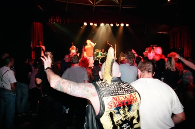 Enjoying the band at the punk festival in the summer of 2000. Photo by D J Clark.