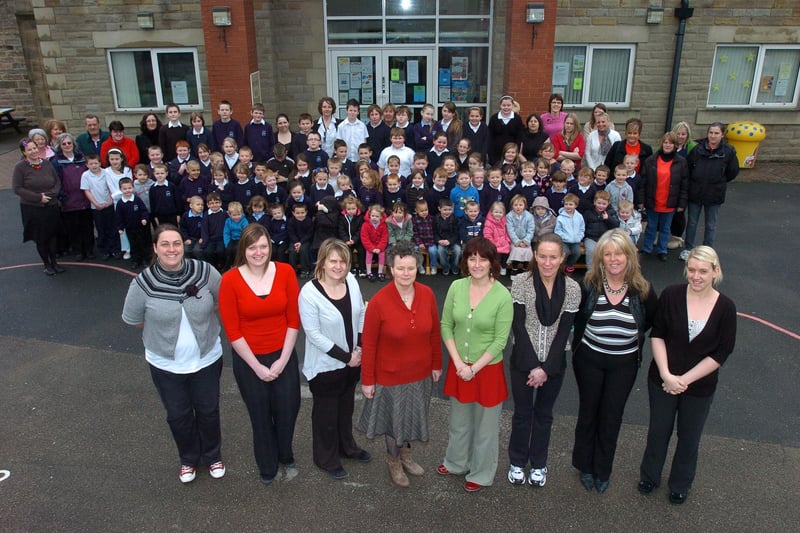 Staff and pupils at Skerton Primary School before its closure.