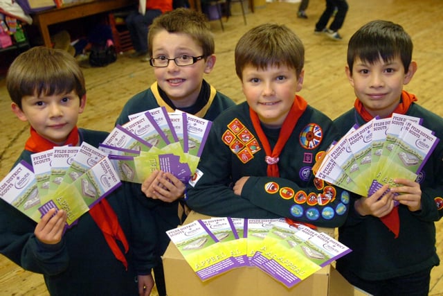 From left, Dylan Garner, eight, Tom Carr, 10, Harry Royle,10, and Larry Tang, 10, from 8th Lytham Fylde Cub Scouts with some of their 30,000 leaflets for a Buy a Brick appeal in 2012