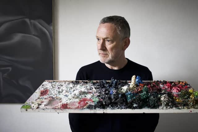 Neil Arthur from Blancmange with floating paint.