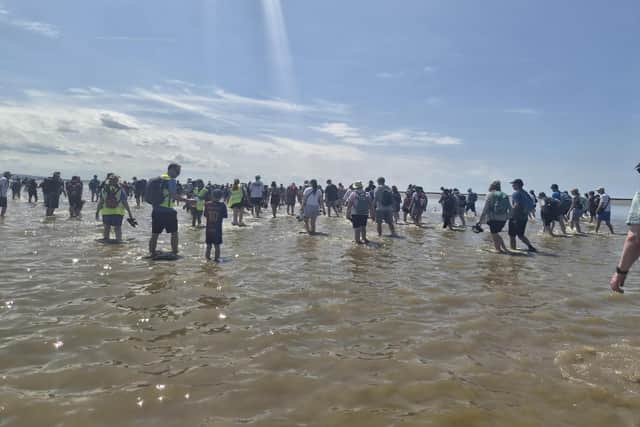Fundraisers take part in the CancerCare cross bay walk 2026.