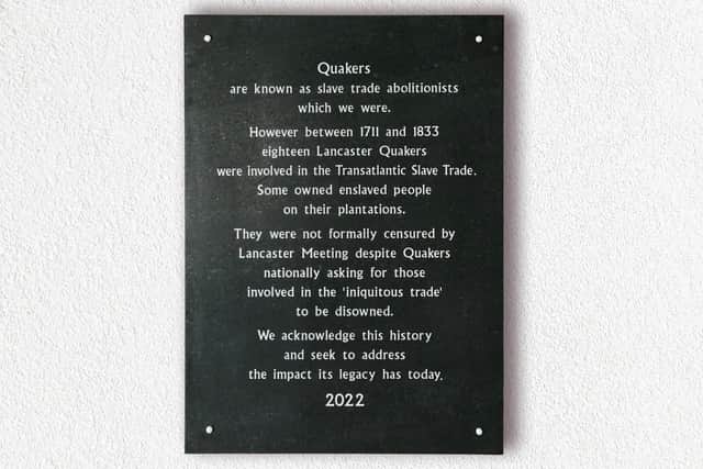 Lancaster Quakers acknowledge role as slave traders and slave owners in a new plaque in the porch of their meeting house.