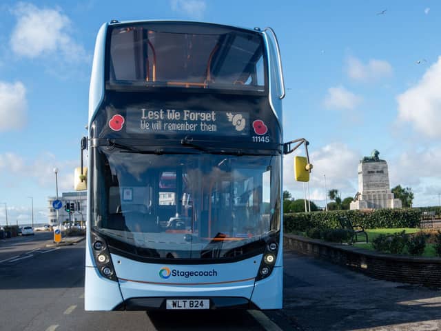 Stagecoach have launched their Poppy Appeal busses.  Stagecoach MD Tom Waterhouse at the cenotaph in Morecambe with the Poppy Bus. Picture by  ©Sheenah Alcock Photography & Film.
