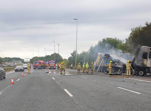 Fire crews working at the scene on the M6 in Preston this morning (Friday, July 29)