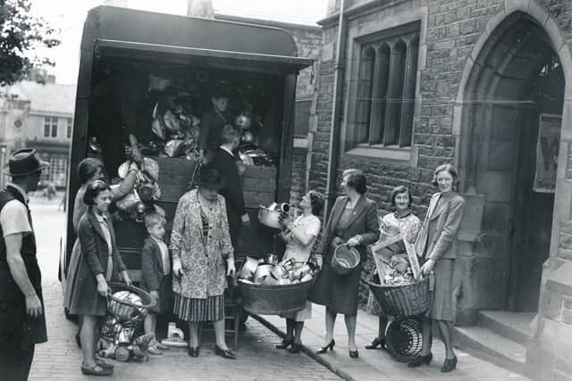Local community donating metal to the war effort. Picture courtesy of Lancaster Guardian archive.