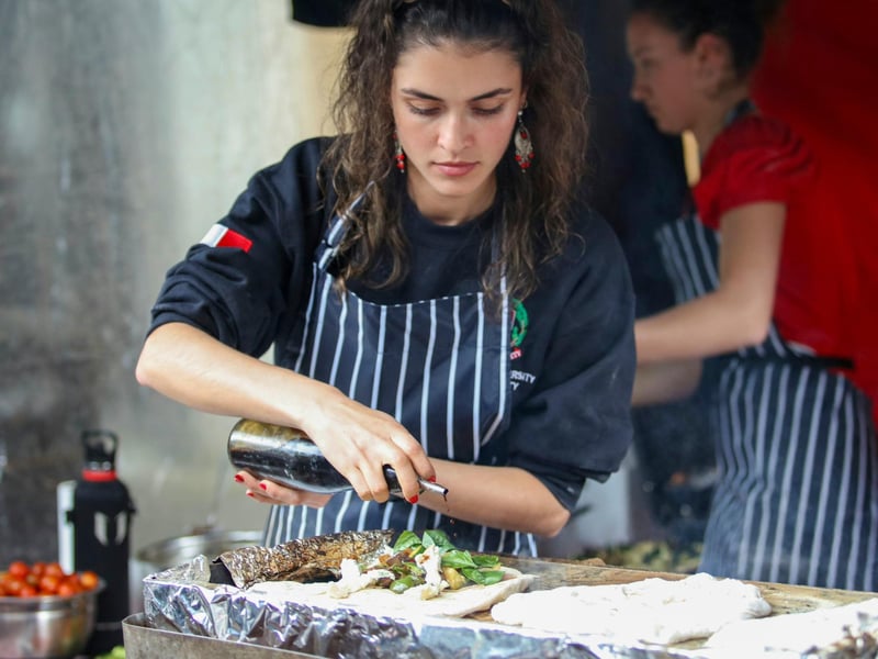 Cooking Italian food at one of the many food stalls at Lancaster Festa Italia.