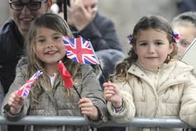Youngsters wait for a glimpse of the Queen during her visit to Lancaster and Bilsborrow in 2015.