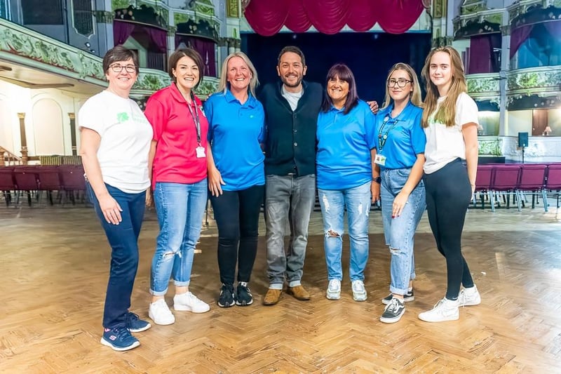 Some of the St John's Hospice staff and volunteers with Jon Richardson.