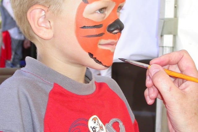 Face painting at a Leighton Moss spring fair.