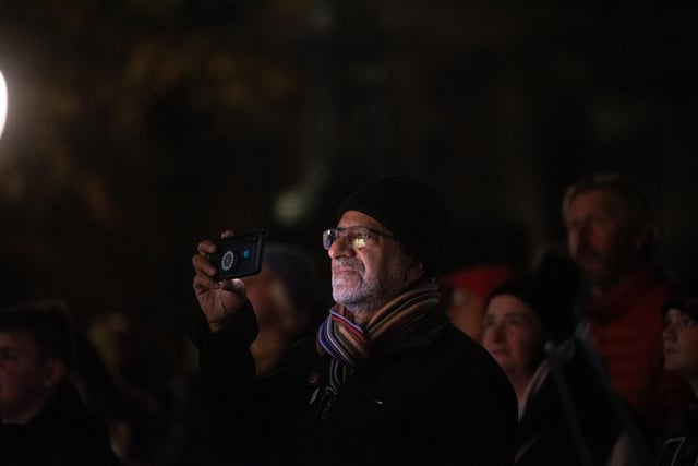 Taking a photo of the spectacles at Light Up Lancaster.