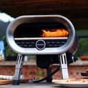Summer's coming: The Revolve Pizza Oven makes cooking pizza enjoyable, easy and social.