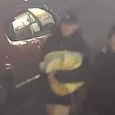 Police want to speak to two men captured on CCTV in connection with two burglaries in Heysham.