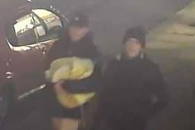Police want to speak to two men captured on CCTV in connection with two burglaries in Heysham.