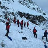 Rescue teams on the mountain rescuing Ben Longton from Lancaster.
