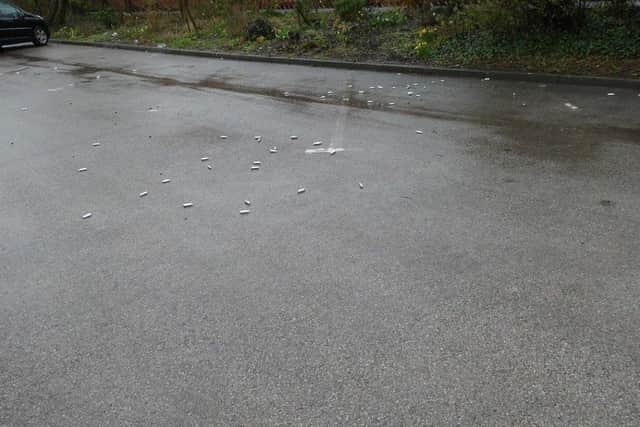 Discarded laughing gas canisters at Bare Lane station car park in Morecambe. Photo from BTP Lancashire.