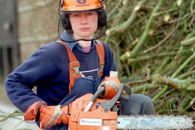 Volunteer worker Denise Lorne with chainsaw and safety equipment at Leighton Moss.