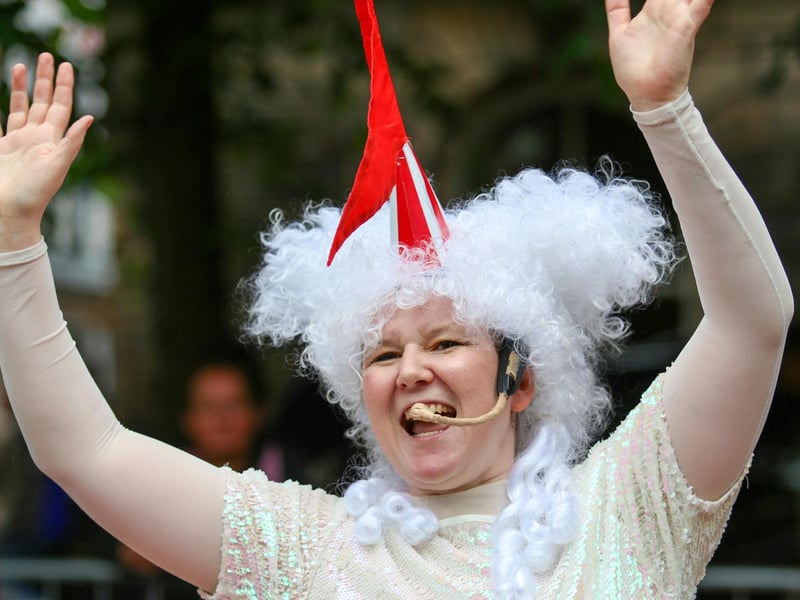 A performer waves to the crowds at Lancaster Festa Italia.