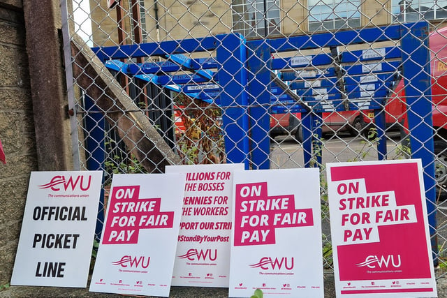 Some of the signs on display at the picket line.