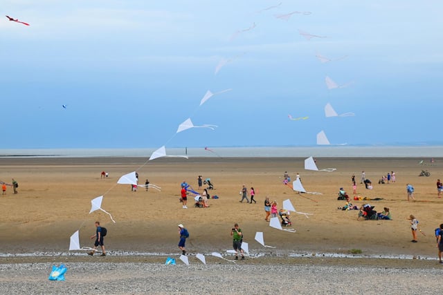 People on the beach at the Catch the Wind Kite Festival in Morecambe. Picture by Michelle Adamson.
