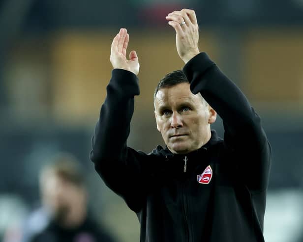 Morecambe boss Ged Brannan applauds those Shrimps fans who made the journey to Swansea City Picture: Eddie Keogh/Getty Images