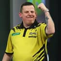 Dave Chisnall defeated Daryl Gurney in the last 16 of the Paddy Power World Darts Championship at Alexandra Palace Picture: Kieran Cleeves/PDC