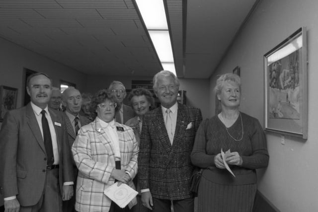 Derek Batey, star of Mr and Mrs, one of television's longest-running game shows, opens an art exhibition at the Clifton Hospital in Lytham. The exhibition features work by Lytham St Annes members of the Fylde Arts Society