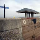Storm boards in place on the promenade.