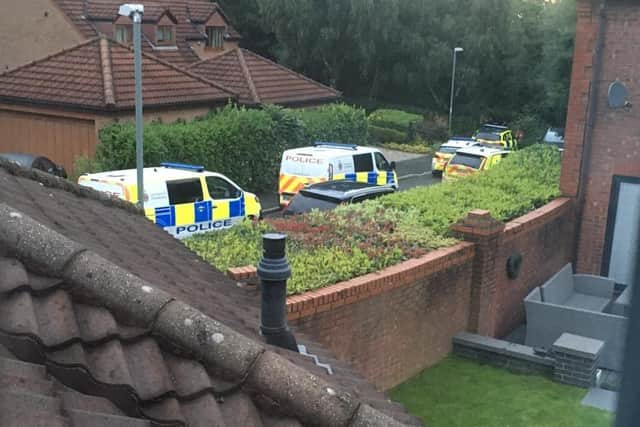 Police at the scene on the Holland House estate in Walton-le-Dale, near the River Darwen, on Thursday morning (August 3). (Photo by submitted)