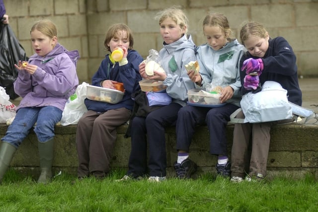 Brownies from 14th Lancashire and 1st Garstang enjoy lunch at the Brownies 90th party held at Guys Farm, near Forton, in 2004