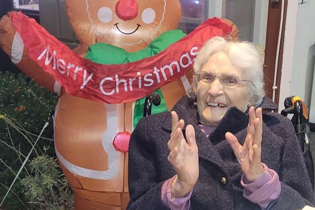 One of the residents at Laurel Bank care home, Lizanne, enjoying the Christmas lights switch-on.