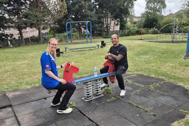 Cat Smith MP and Yak Patel in the play area.
