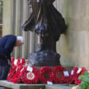 Paying respects at Lancaster War Memorial.