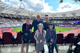 Barrie Wells with Katarina Johnson-Thompson and youngsters in one of his VIP boxes.
