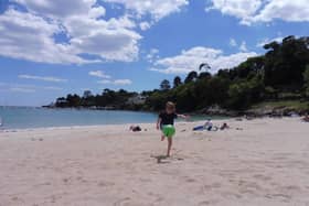 Tom playing on the beach in Brittany.