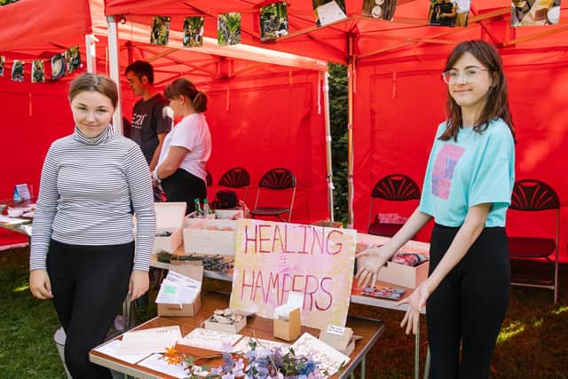 Young people selling their work at the E2M Green Festival. Photo by Ginny Koppenhol