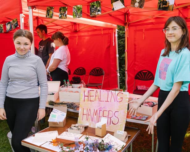 Young people selling their work at the E2M Green Festival. Photo by Ginny Koppenhol