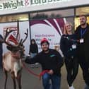 Christmas Market organiser, Clare Lyden, centre, with partner, Jack Taylor and the reindeer handlers.