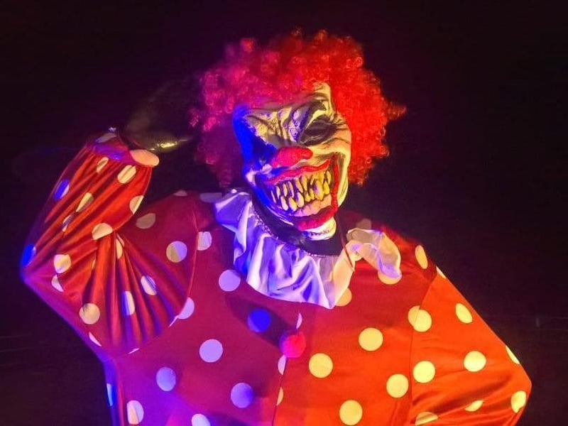 The Eric Morecambe statue dressed up in full Halloween clown costume.