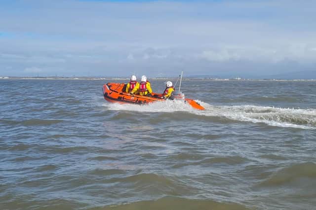 A man and his dog were rescued by Morecambe RNLI after being cut off by the tide near Sandylands promenade in Morecambe. Picture from Morecambe RNLI.
