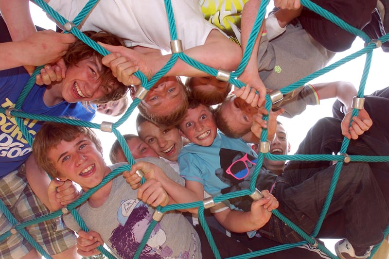 Pupils from Morecambe High School on the spider's web at the new Natural Adventure Play Area in Happy Mount Park.