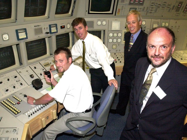 Alan Purdy, Hartlepool Simulator Tutor, with  Clive Shaw, Heysham 1 Simulator Tutor, run through an exercise on Heysham Power Station's new simulator watched by Norman Harrison, Heysham 1 Station Director and Peter Webster, Hartlepool Station Director.