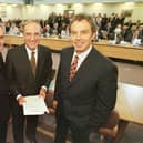 ​Bertie Ahern, Senator George Mitchell and Tony Blair after the signing of the agreement on April 10 1998
