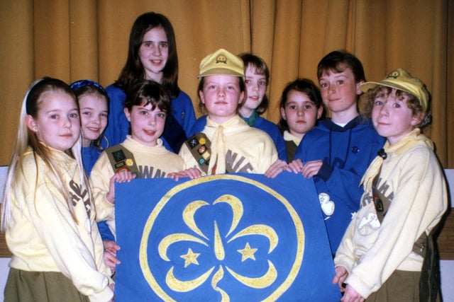 Lytham district guides and brownies with the World Badge at their Thinking Day Campfire in 1998