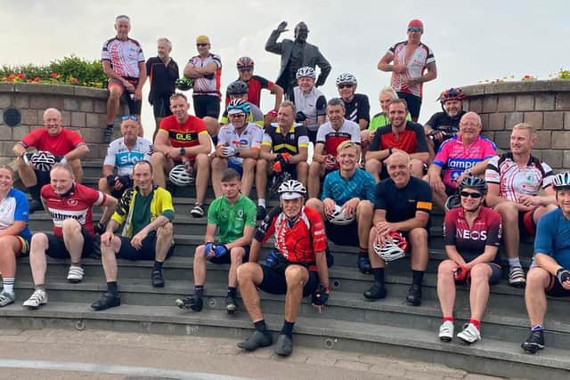 The team in Morecambe at the end of the ride.