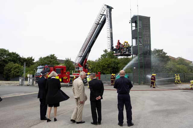The Prince of Wales watches a display during his visit to Morecambe Community Fire Station to view the work of The Princes’ Trust and the Lancashire Fire and Rescue Service.