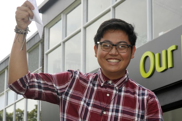 Matthew DeGuzman with his A-level results at Our Lady's Catholic College.